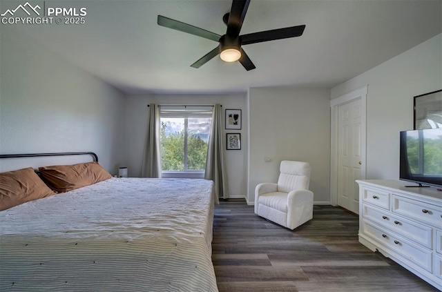 4530 W Jet Wing Cir, Colorado Springs, CO 80916 - bedroom featuring dark wood-type flooring and a ceiling fan