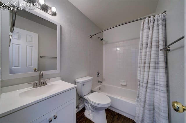 4530 W Jet Wing Cir, Colorado Springs, CO 80916 - full bath with shower / bathtub combination with curtain, vanity, wood finished floors, and a textured wall