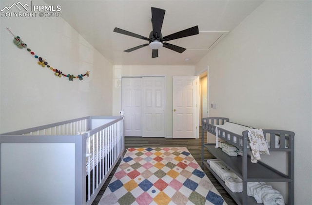 4530 W Jet Wing Cir, Colorado Springs, CO 80916 - bedroom featuring attic access, wood finished floors, a closet, and ceiling fan