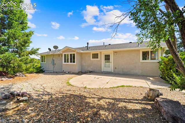 3970 Old Ranch Rd, Colorado Springs, CO 80908 - back of house with stucco siding and a patio area