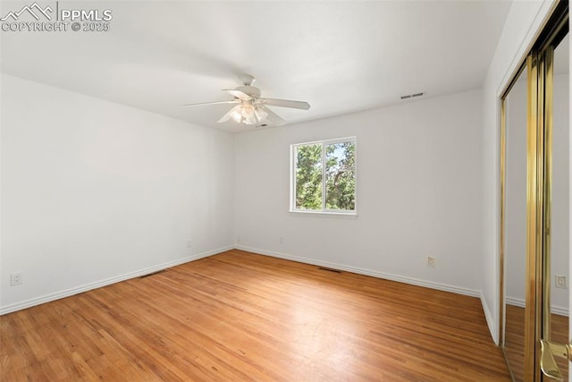 3970 Old Ranch Rd, Colorado Springs, CO 80908 - unfurnished bedroom with light wood-style floors, a closet, and a ceiling fan