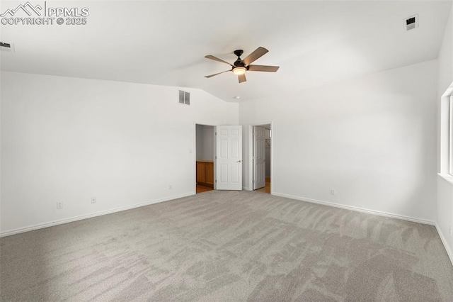 3970 Old Ranch Rd, Colorado Springs, CO 80908 - unfurnished bedroom featuring carpet flooring, vaulted ceiling, a walk in closet, and a ceiling fan