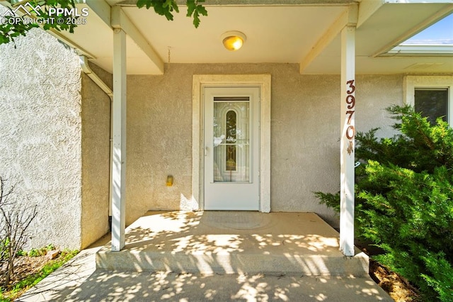3970 Old Ranch Rd, Colorado Springs, CO 80908 - doorway to property with stucco siding