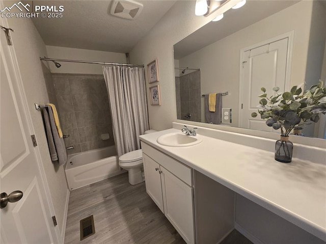 8136 Kittrick Pl, Peyton, CO 80831 - bathroom with vanity, shower / bathtub combination with curtain, and wood finished floors