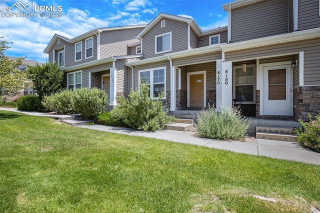 8170 Snow Bowl Hts, Fountain, CO 80817 - multi unit property featuring a front yard, a porch, and stone siding