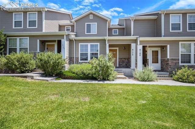 8170 Snow Bowl Hts, Fountain, CO 80817 - multi unit property featuring a front lawn and stone siding