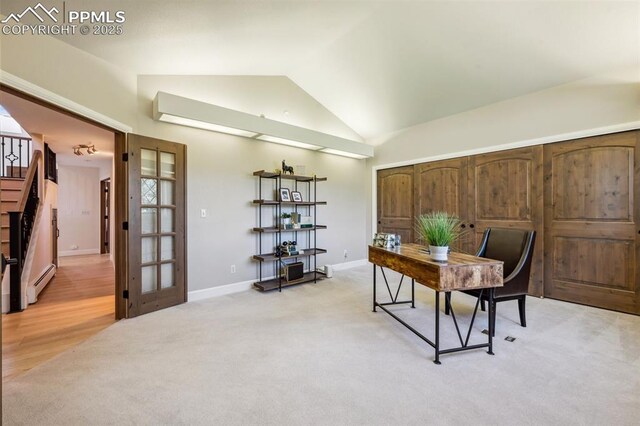 780 Mission Hill Way, Colorado Springs, CO 80921 - office area featuring vaulted ceiling, baseboard heating, light colored carpet, and french doors