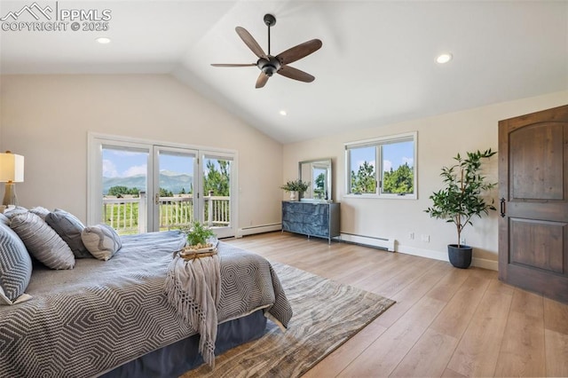 780 Mission Hill Way, Colorado Springs, CO 80921 - bedroom featuring a baseboard radiator, access to outside, vaulted ceiling, light wood finished floors, and ceiling fan
