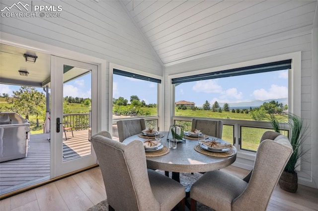 780 Mission Hill Way, Colorado Springs, CO 80921 - sunroom with lofted ceiling, outdoor dining space, and plenty of natural light