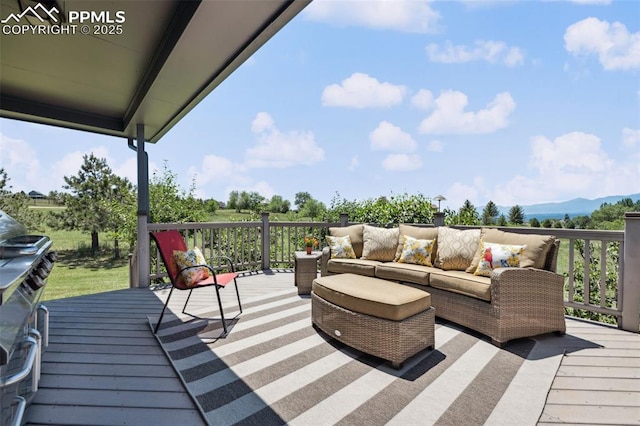780 Mission Hill Way, Colorado Springs, CO 80921 - wooden terrace featuring an outdoor hangout area and a mountain view