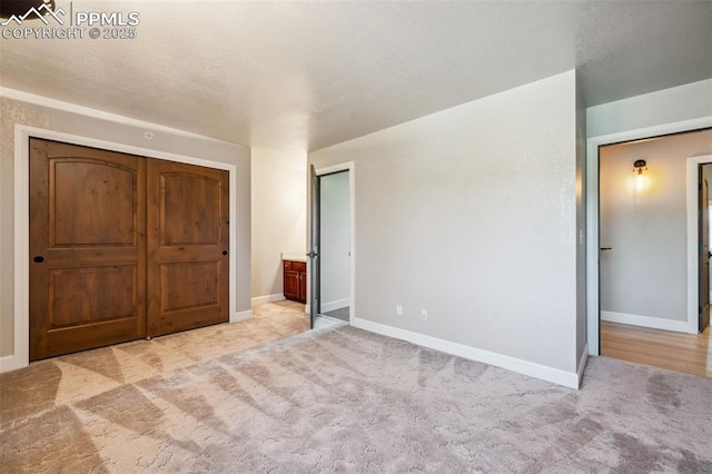 780 Mission Hill Way, Colorado Springs, CO 80921 - unfurnished bedroom with light carpet and baseboards