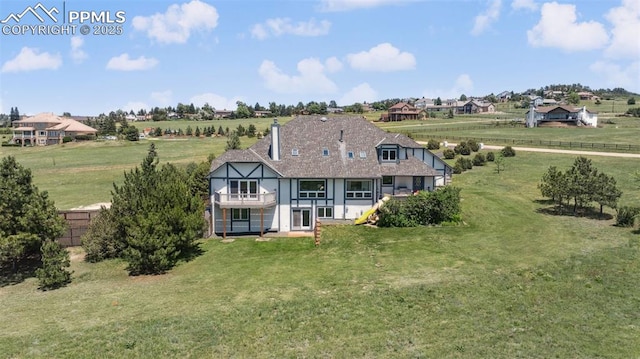 780 Mission Hill Way, Colorado Springs, CO 80921 - rear view of house featuring a balcony and a sunroom