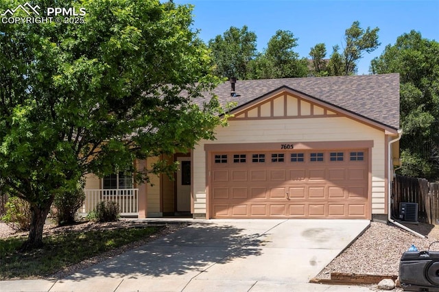 7605 Artisan Pl, Fountain, CO 80817 - view of front of home with an attached garage, driveway, and a shingled roof