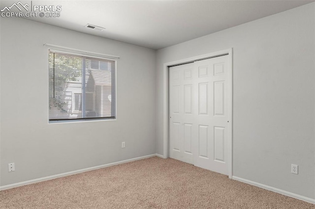 7605 Artisan Pl, Fountain, CO 80817 - unfurnished bedroom featuring carpet floors and a closet