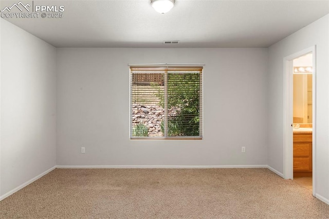 7605 Artisan Pl, Fountain, CO 80817 - unfurnished room featuring light carpet and baseboards