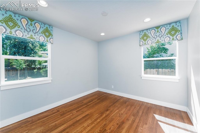 1514 W Platte Ave, Colorado Springs, CO 80904 - unfurnished room featuring wood finished floors and recessed lighting