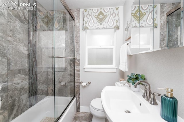 1514 W Platte Ave, Colorado Springs, CO 80904 - bathroom featuring a sink and shower / bath combination with glass door
