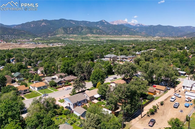 1514 W Platte Ave, Colorado Springs, CO 80904 - aerial perspective of suburban area with a mountain backdrop