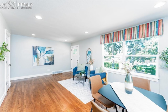 1514 W Platte Ave, Colorado Springs, CO 80904 - living area featuring wood finished floors and recessed lighting