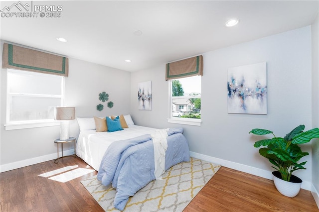 1514 W Platte Ave, Colorado Springs, CO 80904 - bedroom with wood finished floors and recessed lighting