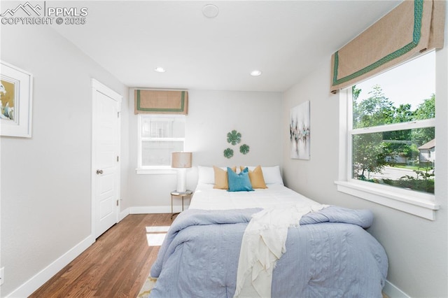 1514 W Platte Ave, Colorado Springs, CO 80904 - bedroom with wood finished floors and recessed lighting