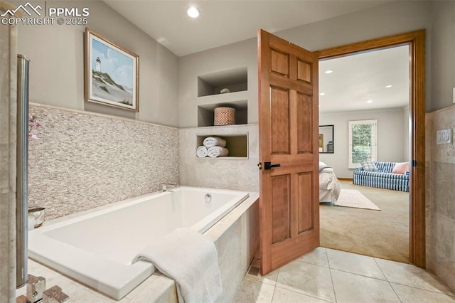 1282 Hill Cir, Colorado Springs, CO 80904 - ensuite bathroom featuring a bath, tile patterned flooring, and recessed lighting