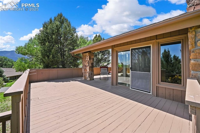 1282 Hill Cir, Colorado Springs, CO 80904 - wooden deck with a mountain view