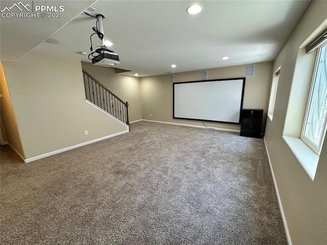 9767 Carnival Ln, Fountain, CO 80817 - carpeted cinema room with baseboards and recessed lighting