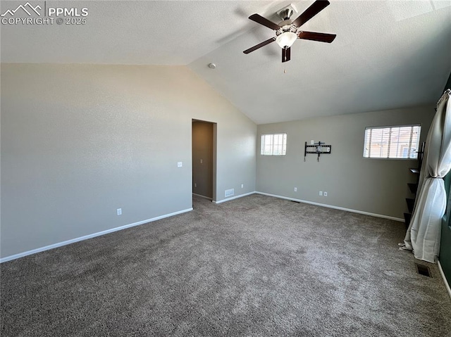9767 Carnival Ln, Fountain, CO 80817 - carpeted spare room featuring a ceiling fan, vaulted ceiling, and a textured ceiling