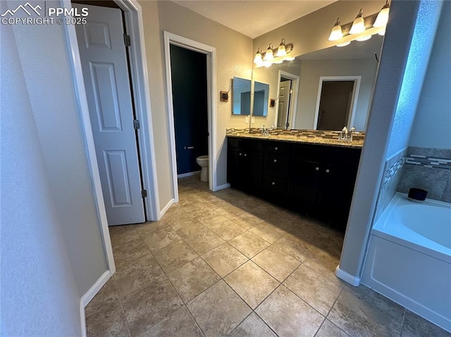 9767 Carnival Ln, Fountain, CO 80817 - full bath featuring double vanity, a bath, and tile patterned flooring