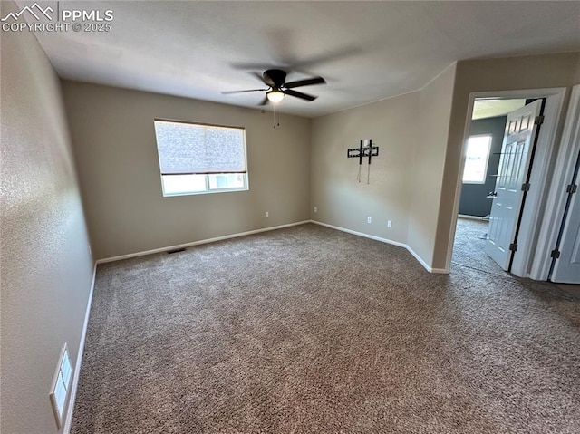 9767 Carnival Ln, Fountain, CO 80817 - carpeted spare room featuring plenty of natural light and a ceiling fan