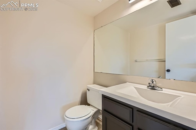 7025 Nettlewood Pl, Colorado Springs, CO 80918 - bathroom featuring toilet and vanity