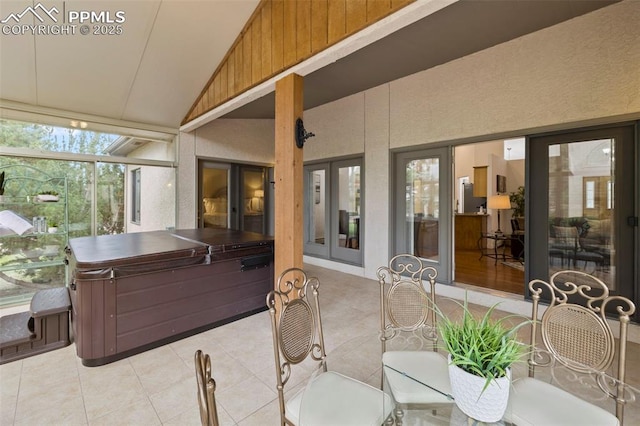 10 Desert Inn Way, Colorado Springs, CO 80921 - sunroom featuring a jacuzzi, lofted ceiling, french doors, tile patterned flooring, and outdoor dining area