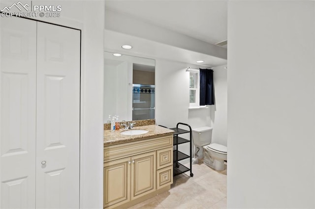 10 Desert Inn Way, Colorado Springs, CO 80921 - full bathroom with a closet, vanity, tile patterned floors, and recessed lighting