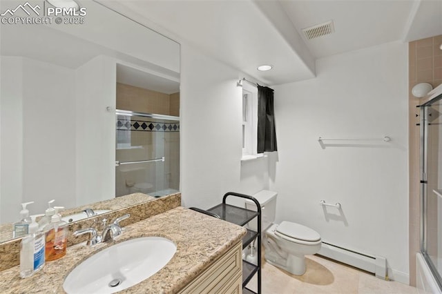 10 Desert Inn Way, Colorado Springs, CO 80921 - bathroom with a baseboard heating unit, vanity, tile patterned floors, and bath / shower combo with glass door