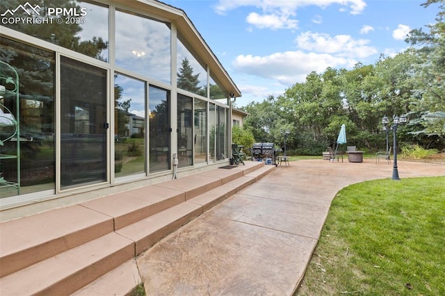 10 Desert Inn Way, Colorado Springs, CO 80921 - view of patio featuring a sunroom