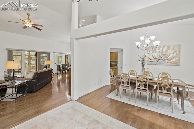 10 Desert Inn Way, Colorado Springs, CO 80921 - dining area with a chandelier, wood finished floors, and ceiling fan