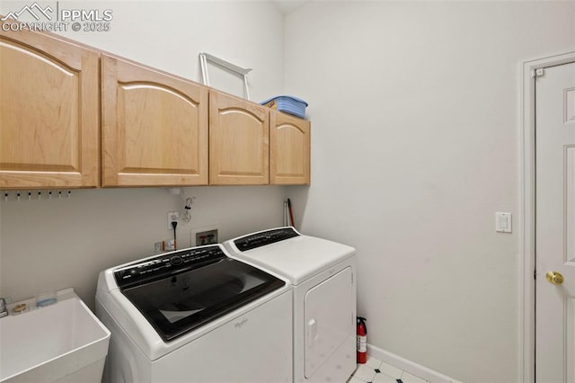 10 Desert Inn Way, Colorado Springs, CO 80921 - laundry area featuring cabinet space and separate washer and dryer