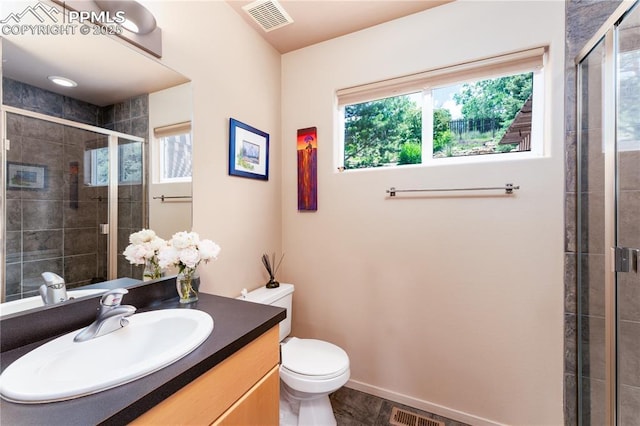 616 Tierra Verde Ct, Colorado Springs, CO 80904 - bathroom with vanity and a shower stall