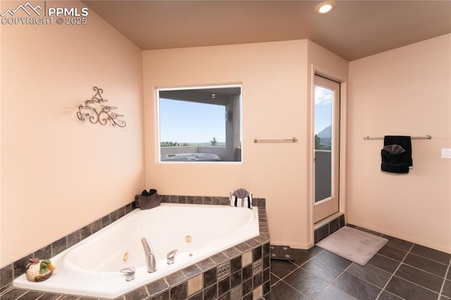 616 Tierra Verde Ct, Colorado Springs, CO 80904 - full bathroom with a whirlpool tub, tile patterned flooring, and recessed lighting