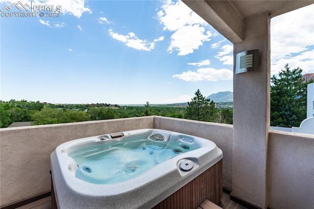 616 Tierra Verde Ct, Colorado Springs, CO 80904 - balcony with a hot tub and a mountain view