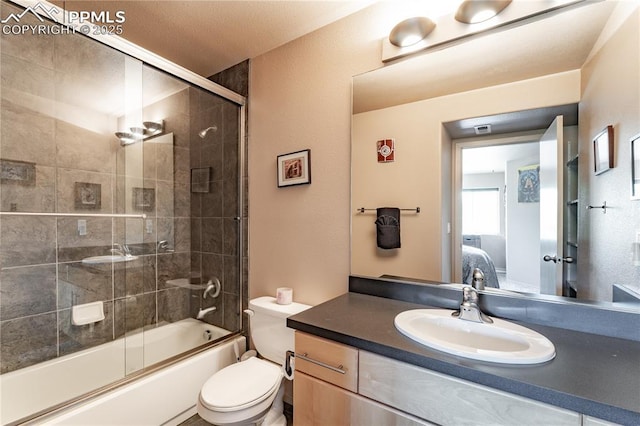 616 Tierra Verde Ct, Colorado Springs, CO 80904 - full bathroom featuring ensuite bathroom, vanity, and bath / shower combo with glass door