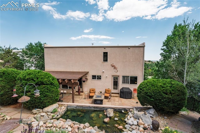 616 Tierra Verde Ct, Colorado Springs, CO 80904 - back of property featuring a patio area and stucco siding