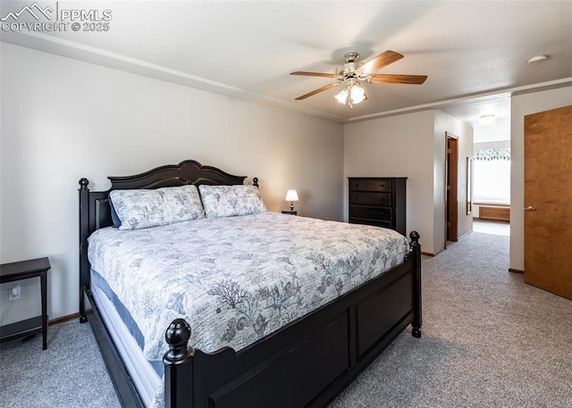 2457 Craycroft Dr, Colorado Springs, CO 80920 - bedroom with light carpet and a ceiling fan