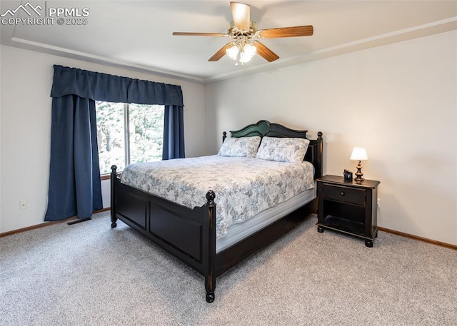 2457 Craycroft Dr, Colorado Springs, CO 80920 - bedroom with light carpet and a ceiling fan