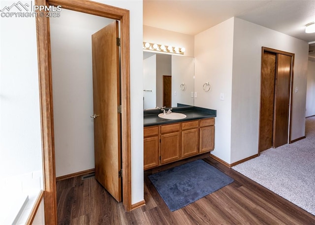 2457 Craycroft Dr, Colorado Springs, CO 80920 - bathroom featuring vanity and wood finished floors