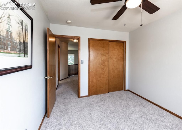 2457 Craycroft Dr, Colorado Springs, CO 80920 - unfurnished bedroom with light carpet, a closet, and a ceiling fan