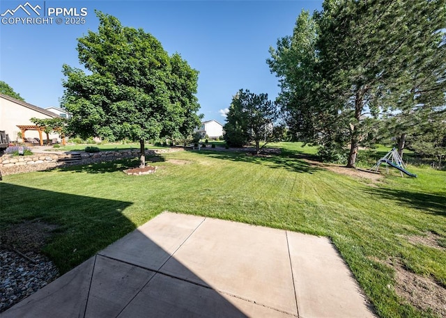 2457 Craycroft Dr, Colorado Springs, CO 80920 - view of grassy yard featuring a patio