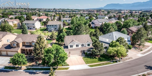 2457 Craycroft Dr, Colorado Springs, CO 80920 - aerial view of residential area featuring a mountainous background