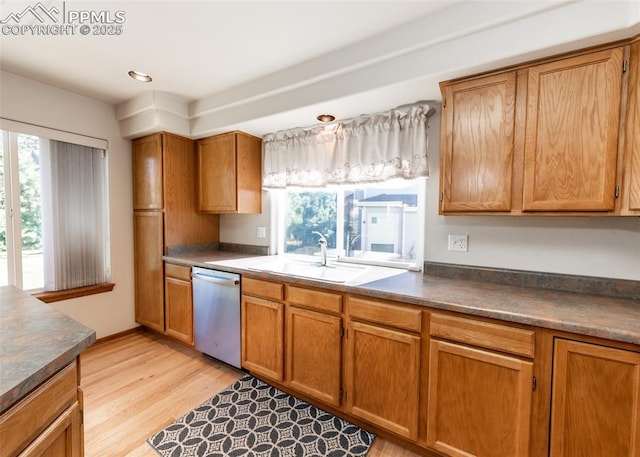 2457 Craycroft Dr, Colorado Springs, CO 80920 - kitchen featuring stainless steel dishwasher, brown cabinets, dark countertops, and recessed lighting